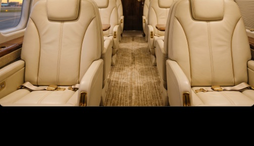 Private jet cabin with leather seating